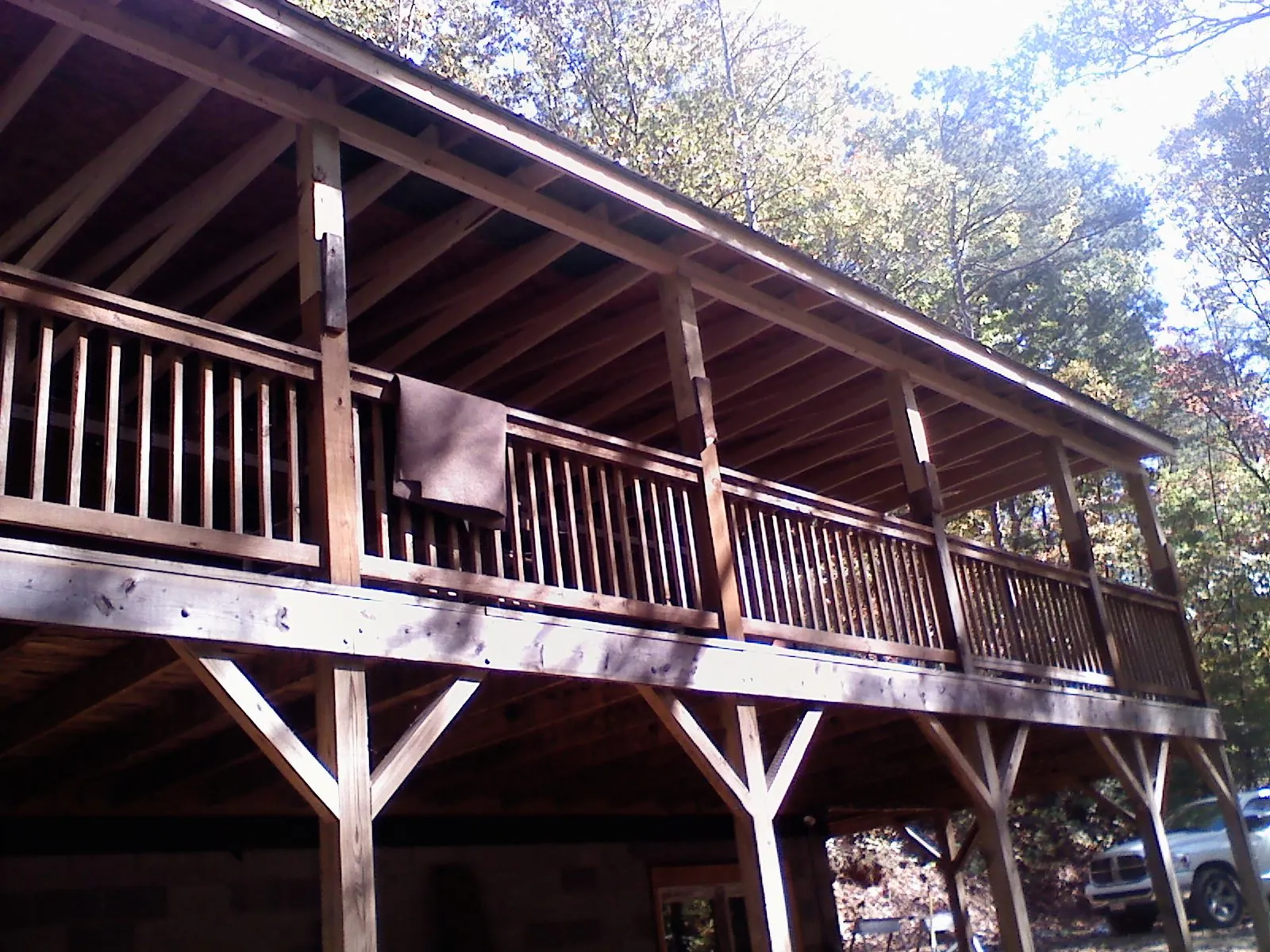 Timber framing under a new elevated porch and deck — Roof Leak Repair in Longmeadow by Roofing Brothers